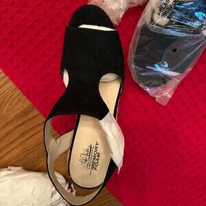Brand new in box pair of black Theresa black  espadrille wedges.